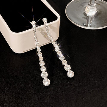 Silver Tone Graduated Clear Stone Long Stud Earrings