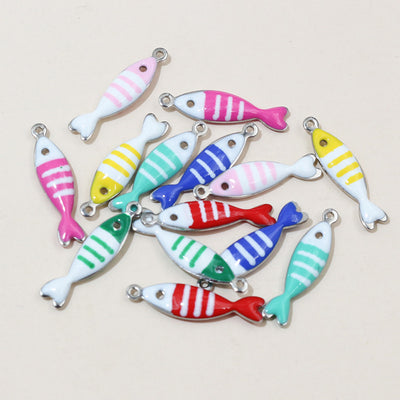 Assorted striped enamel fish charms in assorted bright colors arranged together in the main product view
