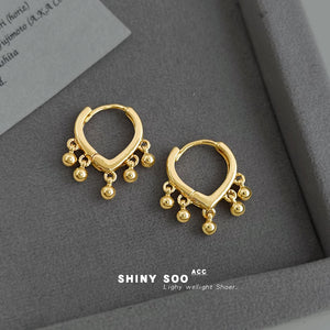 Gold Heart Huggie Hoop Earrings With Dangling Ball Charms