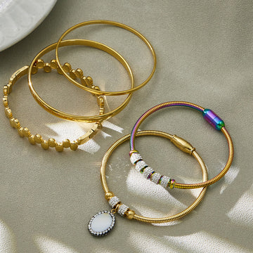 Magnetic and Hinged Bracelet Collection in Eight Metal Finishes