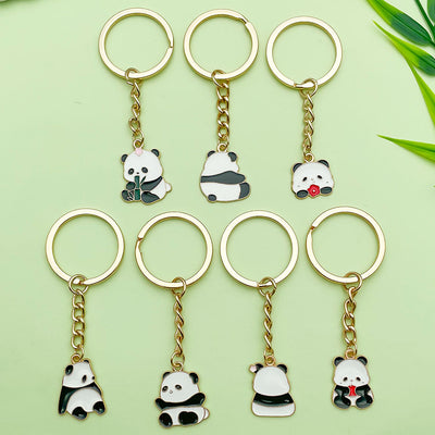 Image 1 showing a bunch of panda key chains.