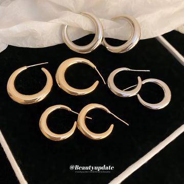 Metallic Hoop and Statement Earrings in Twenty One Styles