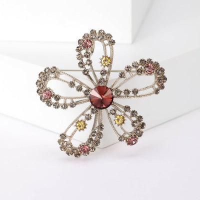 Brown Crystal Flower Brooch front view on a plain background