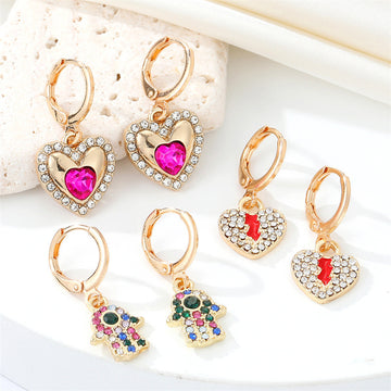 Gold Tone Crystal Heart, Lightning, Eye and Hamsa Huggie Earrings