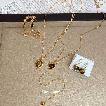 Gold Tiger Eye Star Hoops And Drop Stud Earrings Pair