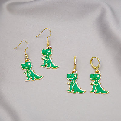 Primary supplied view of green dinosaur dangle earrings