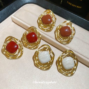 Round Enamel Statement Stud Earrings With Wavy Gold Tone Frames