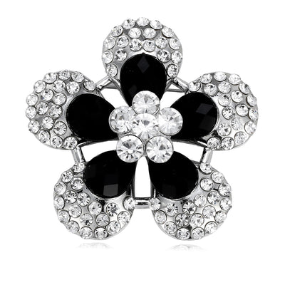 Front product view of black and white crystal flower brooch