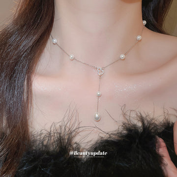 Silver Pearl and Teardrop Y Necklace With A Silver-Tone Finish