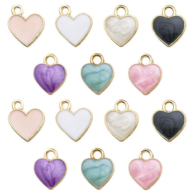 Colorful heart beads arranged on a light background