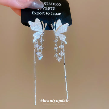 Silver Tone Butterfly Crystal Tassel Earrings with Blue Accents