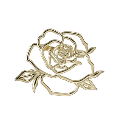 Front product view of the camellia brooch pin in gold and yellow