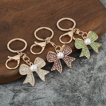 Rhinestone Bow Keychain With Pearl-Like Center And Lobster Clasp