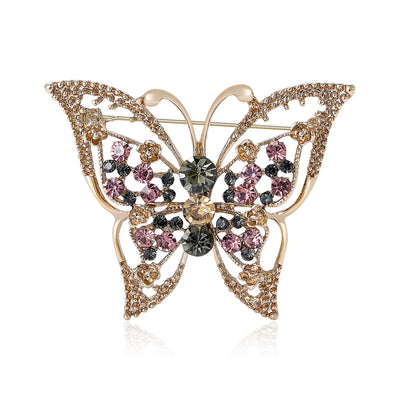 Front view of the openwork butterfly crystal brooch in antique gold tone brooch and its color options