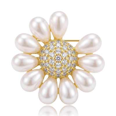 Gold tone pearl petal flower brooch with pave crystal center