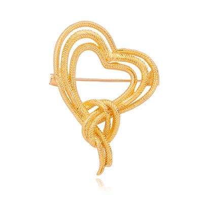 Front product view of the gold heart brooch