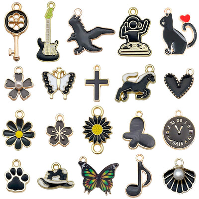 Colorful heart and cross charms arranged on a light background