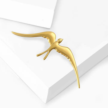 Sleek Swallow Brooch In Gold And Silver Tone Finishes