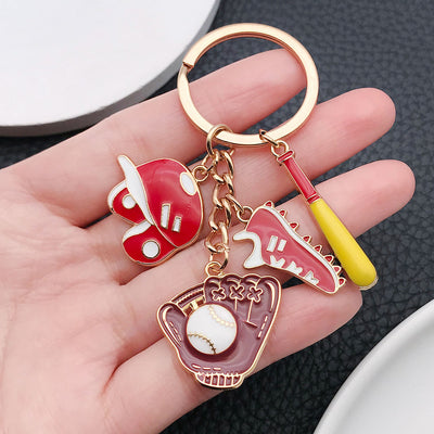Overview showing the available color and design variations of the red baseball glove shoe and bat metal keychain