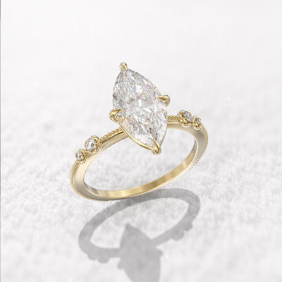 Gold-tone marquise clear solitaire ring