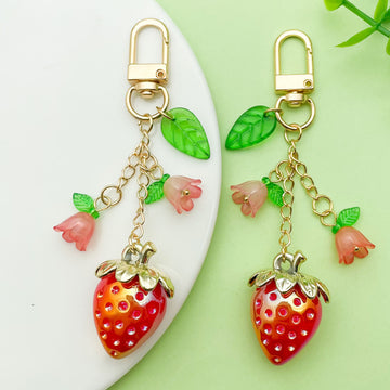 Strawberry Charm Keychains Featuring Red Strawberry Across 15 Pictured Variations