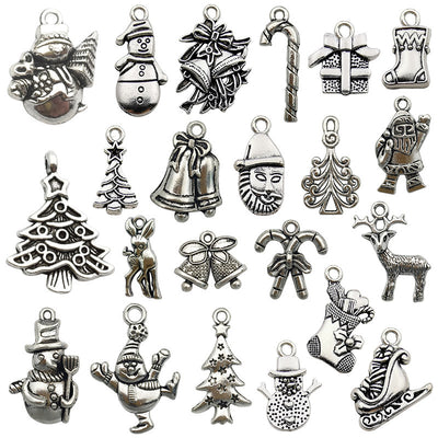 Colorful assorted shape charms arranged on a light background