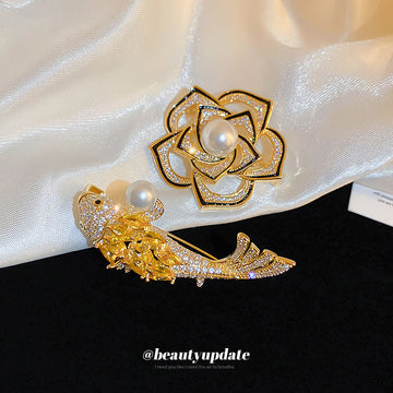 Gold Tone Crystal Fish Brooch With Pearl Like Orb Detail