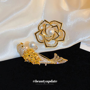Gold Tone Crystal Fish Brooch With Pearl Like Orb Detail