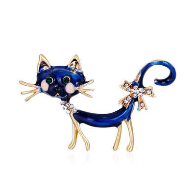 Front product view of the cat brooch pin in blue and gold