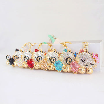 Rhinestone Sleeping Cat Keychain With Flower Accents And Clasp