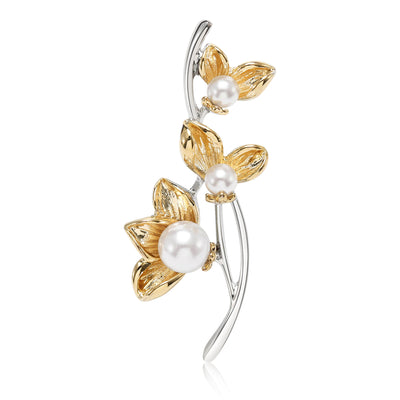 Floral branch with pearl shown from the front