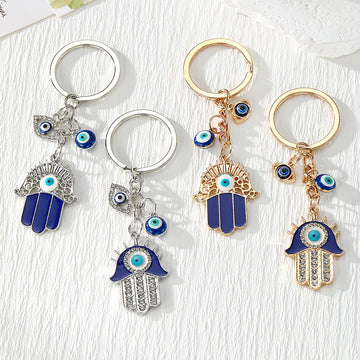 Blue Evil Eye Hamsa Hand Metal Keychains in Four Designs