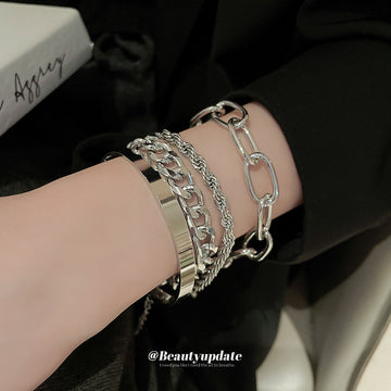 Silver Tone Four Piece Bracelet Stack With Mixed Chain Links