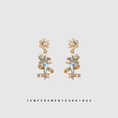 Snowflake blue spiral ribbon drops on gray background