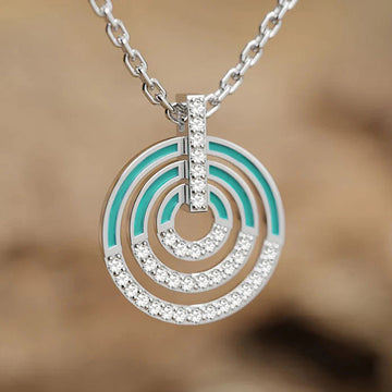 Silver Tone Concentric Circle Pendant Necklace with Turquoise Enamel