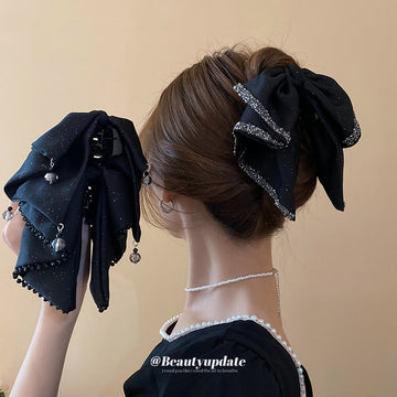 Black Glitter Crystal Edge Bow Hair Claw With Mismatched Gray Variant Image