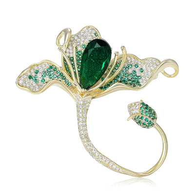 Front view of crystal magnolia loop brooch against a white background.
