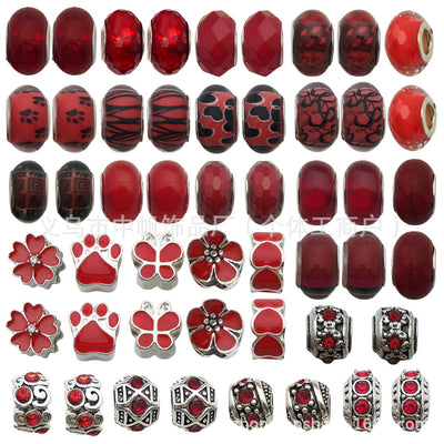 Red bead beads arranged on a light background