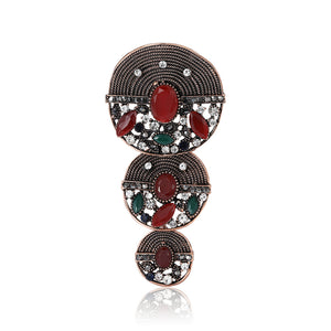 Antique Tone Disc Drop Brooch with Red and Green Stones