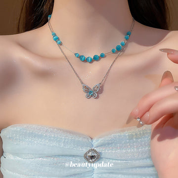 Silver Butterfly Crystal And Blue Cat Eye Bead Necklaces