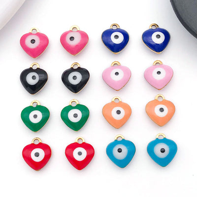 Colorful heart charms arranged on a light background