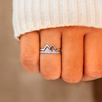 White metal mountain peak double layer ring worn on closed fist