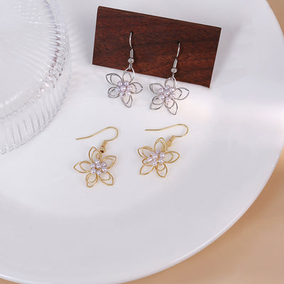 Primary supplied view of open flower hook earrings