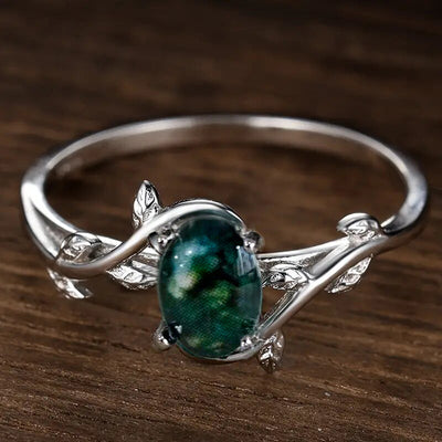 Front silver leaf vine oval green cabochon fashion ring