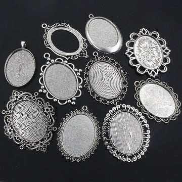Assorted Ornate Oval Cabochon Pendant Trays in Silver Tone Metal