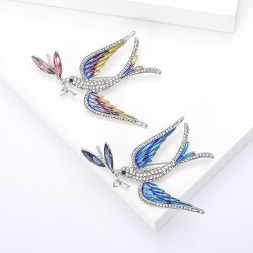 Crystal Swallow Brooch Carrying a Branch in Blue or Purple