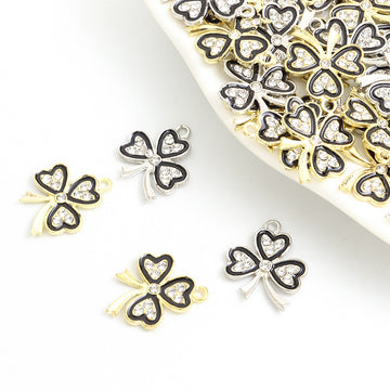 Black Outline Four Leaf Clover Charms in Gold and Silver Tones