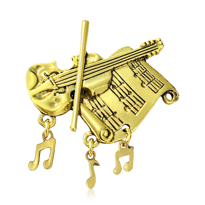 violin and music sheet brooch in gold or silver tone isolated on a white background