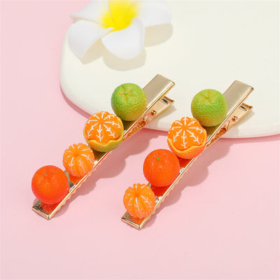 Main product view of gold Tone Orange Fruit Barrette with Four Miniature Charms