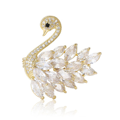 Product image 1 showing the gold tone swan brooch with clear marquise crystals.